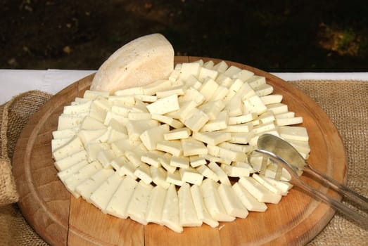 soft cheese on wooden board