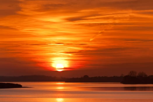 a beautiful sunrise on a big lake