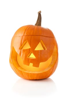 Jack O&#039  lantern lit inside and isolated on white background