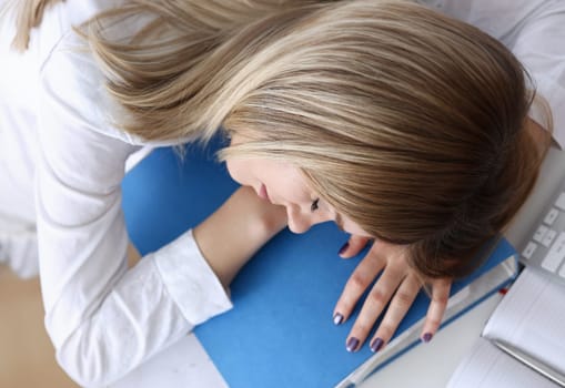 Tired businesswoman at workspace in office take nap. Sleepy white collar idle lazy student study with headache secretary career frustration employment problem paperwork freelance concept