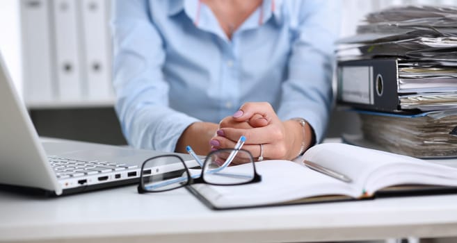Lot of work wait for tired and exhausted woman. Huge pile of document folders headache and depression irs new problems emotion expression vacancy or holiday dream concept