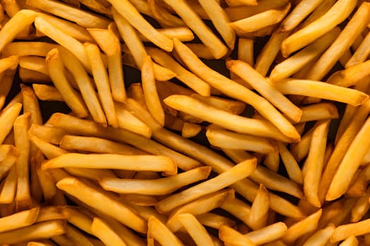 seamless texture and full-frame background of piled French fries, neural network generated image. Not based on any actual scene or pattern.