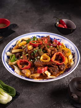 noodles with bell pepper, potatoes, meat and herbs