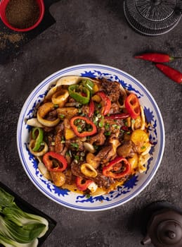 noodles with bell pepper, potatoes, meat and herbs