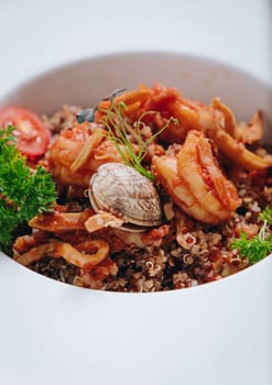 buckwheat with seafood, oyster, tomato and herbs