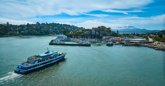 Image of Aerial Golden Gate Ferry heading toward Corinthian Yacht Club on Tiburon coast and distant mountain