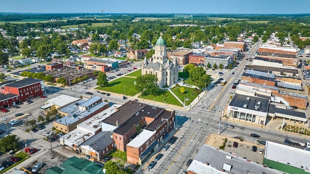 Image of Aerial over downtown Columbia City with courthouse in center surrounded by shops and houses