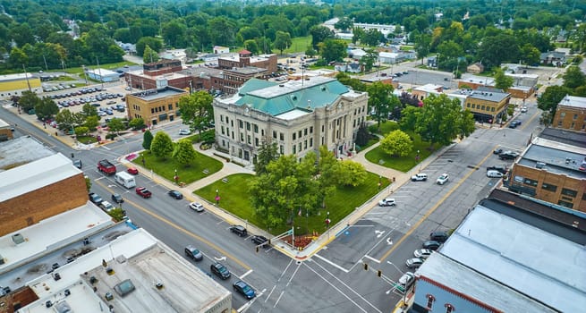 Image of Aerial downtown Auburn Indiana courthouse with green lawn