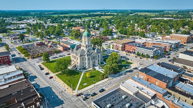 Image of Wide aerial view of Columbia City and courthouse on bright sunny day