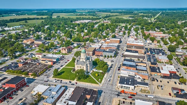 Image of Aerial downtown Columbia City with courthouse and shops with distant houses