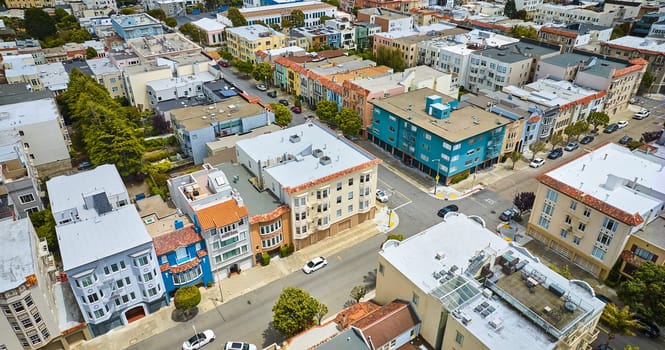 Image of Downward aerial residential buildings in San Francisco with crossing intersection in roads