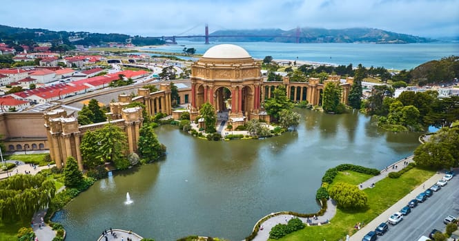 Image of Palace of Fine Arts aerial with lagoon and distant Golden Gate Bridge