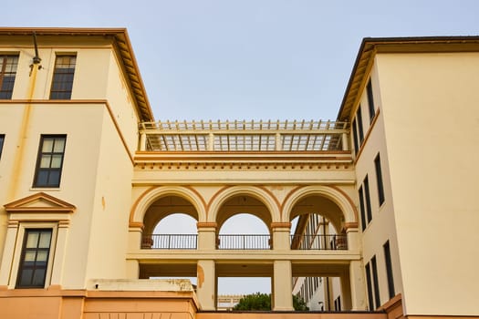 Image of Galileo Academy of Science and Technology front view of building with multiple open walkways