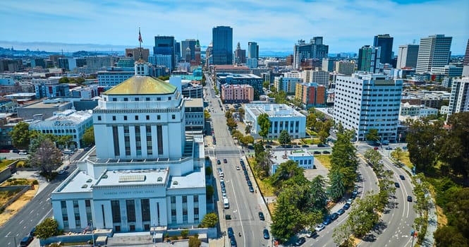 Image of Front of Oakland California courthouse on bright summer day aerial