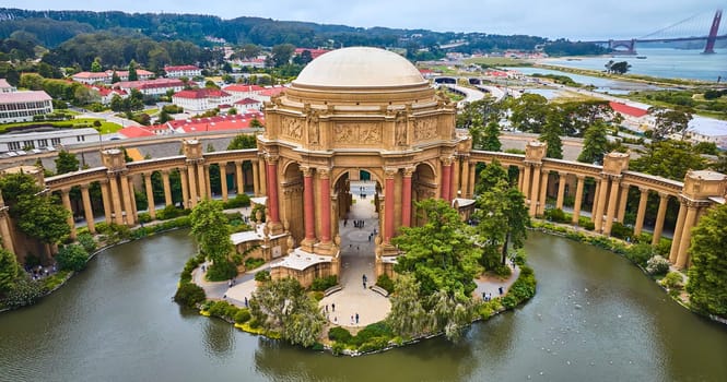 Image of Lagoon around Palace of Fine Arts open air rotunda and colonnade aerial Roman ruins vibe