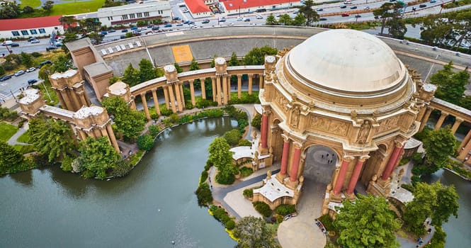 Image of Palace of Fine Arts open air rotunda and colonnade around lagoon in downward aerial