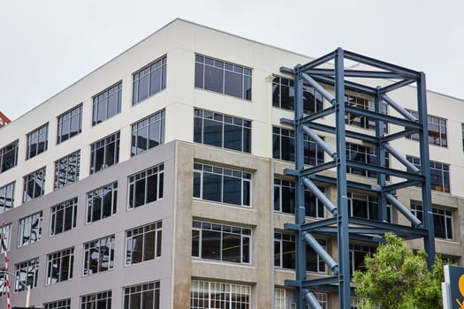 Image of Building with construction on outside with overcast sky