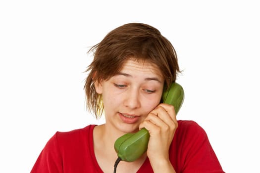 Young woman talking on the phone - isolated on white background