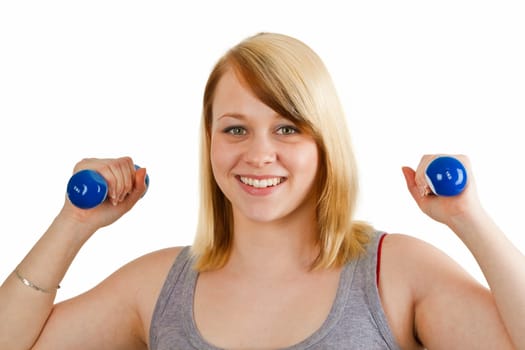 Young woman with dumbbell - isolated on white background