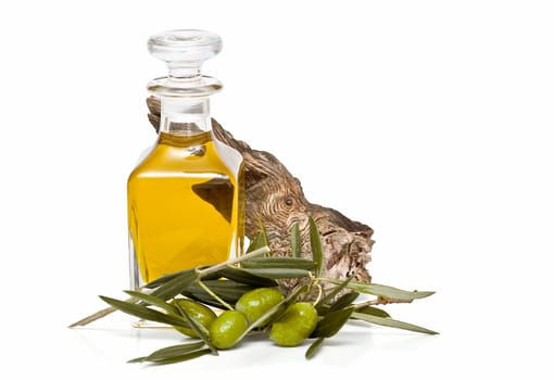 Virgin olive oil and olives isolated on a white background.
