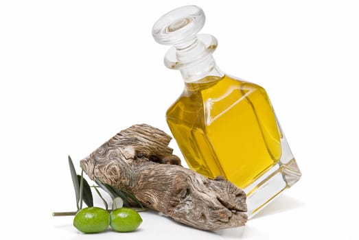 Virgin olive oil and olives isolated on a white background.
