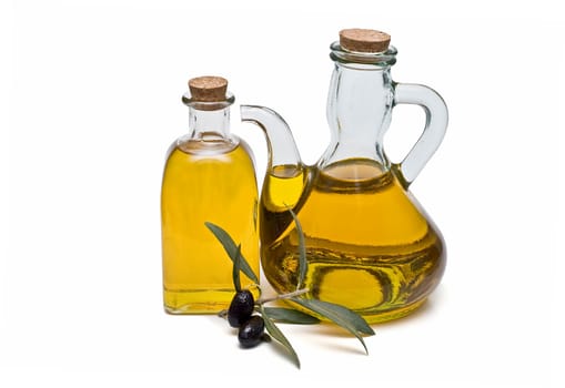 Virgin olive oil and olives isolated on a white background.
