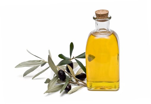 Virgin olive oil and olives isolated on a white background.