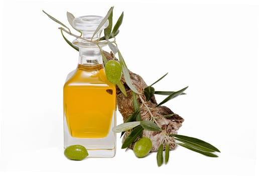 Virgin olive oil and olives isolated on a white background.