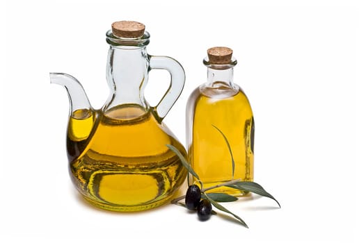 Virgin olive oil and olives isolated on a white background.