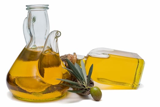 Virgin olive oil and olives isolated on a white background.