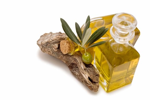 Virgin olive oil and olives isolated on a white background.