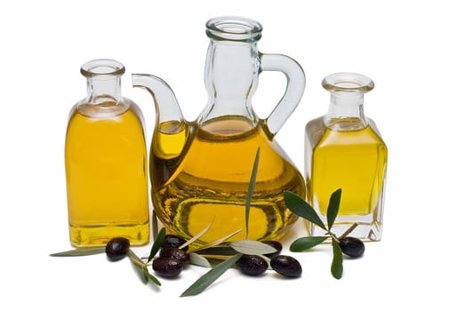 Virgin olive oil and olives isolated on a white background.