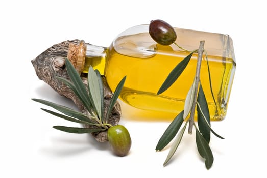Virgin olive oil and olives isolated on a white background.