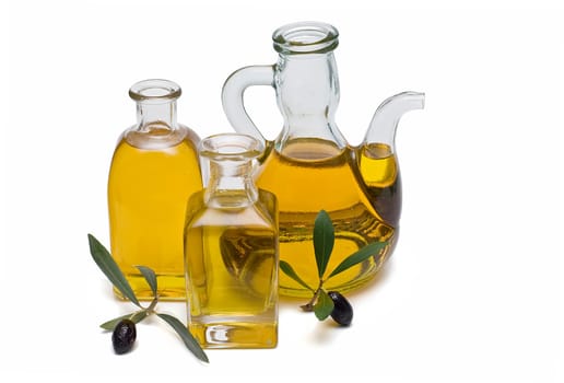 Virgin olive oil and olives isolated on a white background.