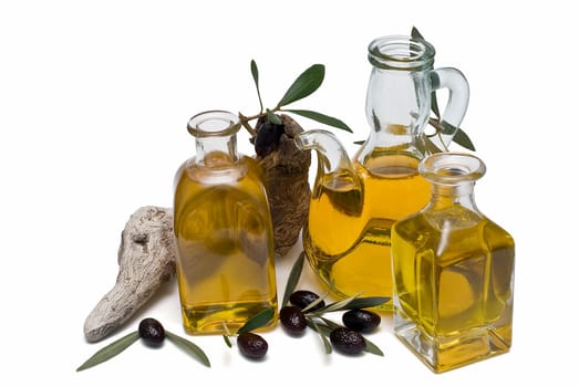 Virgin olive oil and olives isolated on a white background.