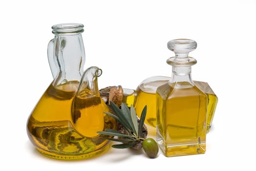 Virgin olive oil and olives isolated on a white background.