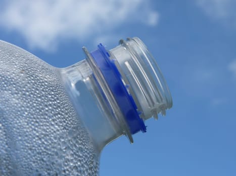 Bottle in front of heaven