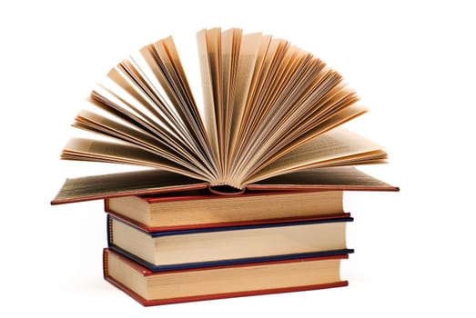 OLd books isolated over a white background.