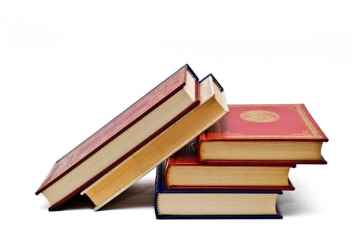 OLd books isolated over a white background.