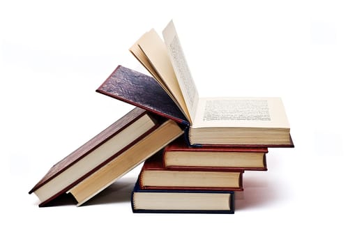OLd books isolated over a white background.