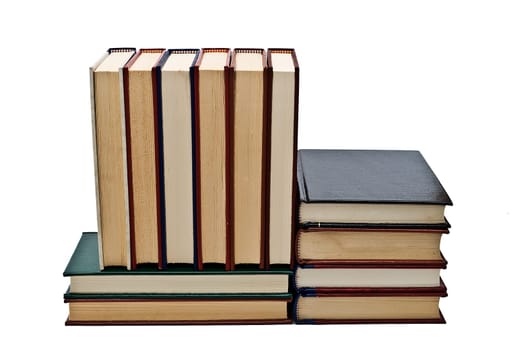 OLd books isolated over a white background.