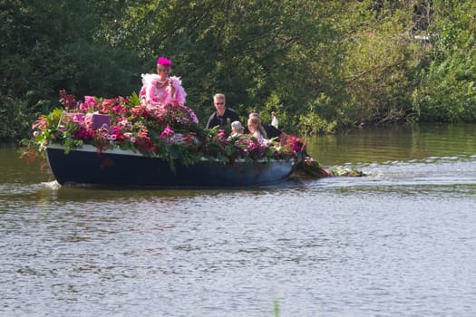 VLAARDINGEN - AUGUST 05: Each year this unique floating parade of beautiful decorated boats sail through the Westland. Theme this year: Theatre on water, August 05, 2011, Vlaardingen, the Netherlands