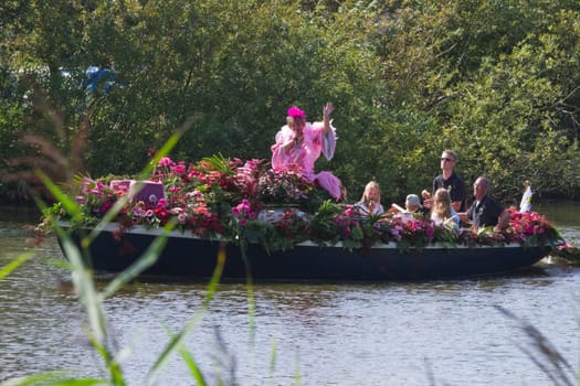 VLAARDINGEN - AUGUST 05: Each year this unique floating parade of beautiful decorated boats sail through the Westland. Theme this year: Theatre on water, August 05, 2011, Vlaardingen, the Netherlands