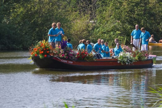 VLAARDINGEN - AUGUST 05: Each year this unique floating parade of beautiful decorated boats sail through the Westland. Theme this year: Theatre on water, August 05, 2011, Vlaardingen, the Netherlands