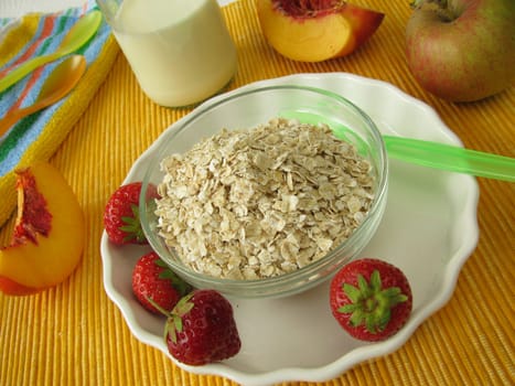 Breakfast for toddlers with muesli ingredients and milk