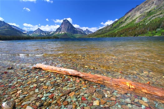 Mount Sinopah rises over Two Medicine Lake on a gorgeous summer day in Glacier National Park.