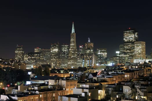 San Francisco skyline at night, dominated by the Transamerica building