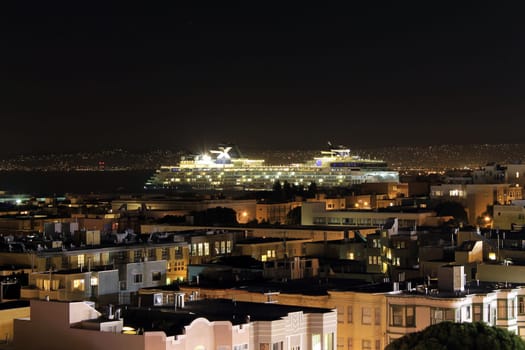 Night shot of a cruise boat in the San Francisco city