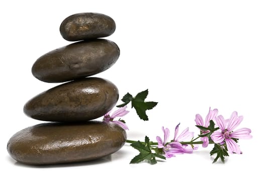 Boulders in zen balance over a white background.