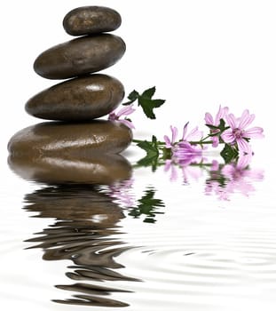 Boulders in zen balance over a white background.
